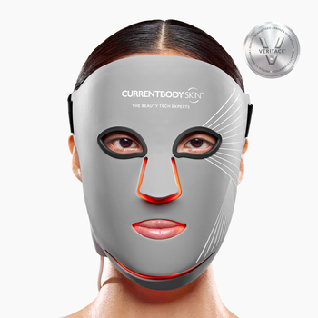 Model wearing the CurrentBody Skin LED Multi-Light Mask face on